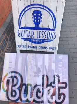 Buckt with Guitar A board