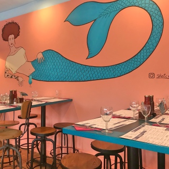 Pretty interior of the restaurant with mermaid